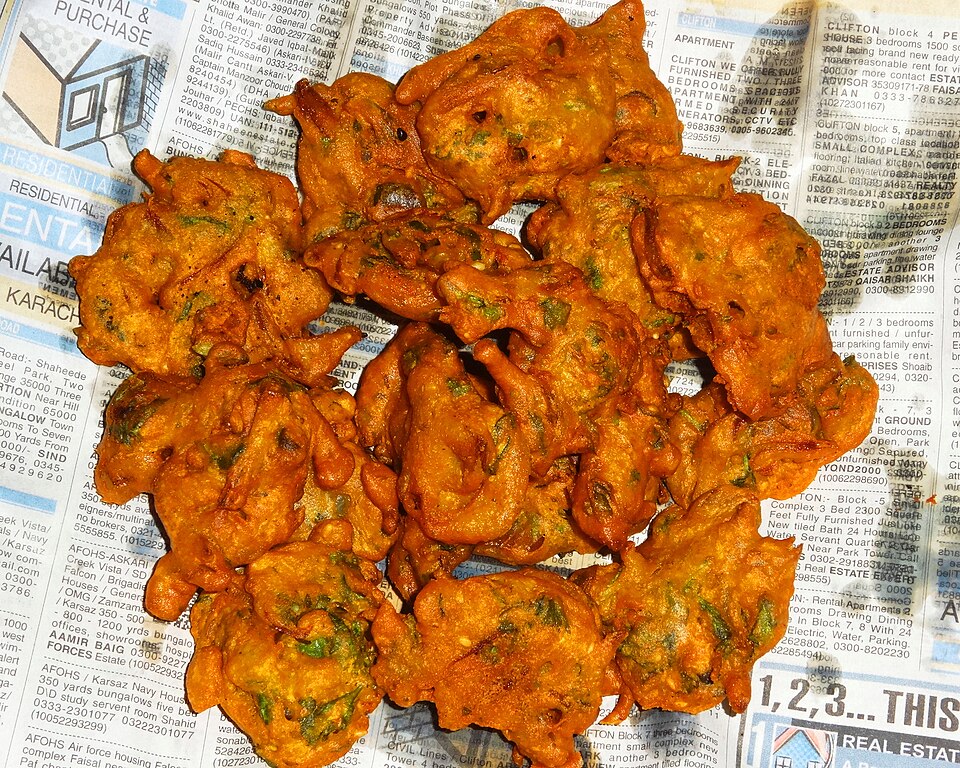 Golden, crisp pakoras served on a plate